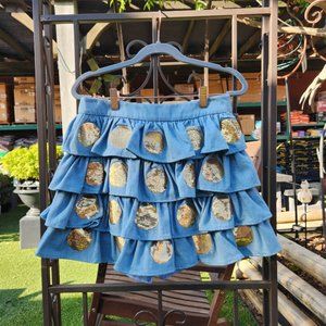 Skirt with gold polka dots